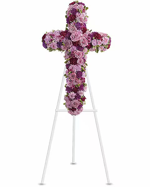 Floral cross arrangement on a stand