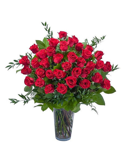 Bouquet of red roses in a glass vase 